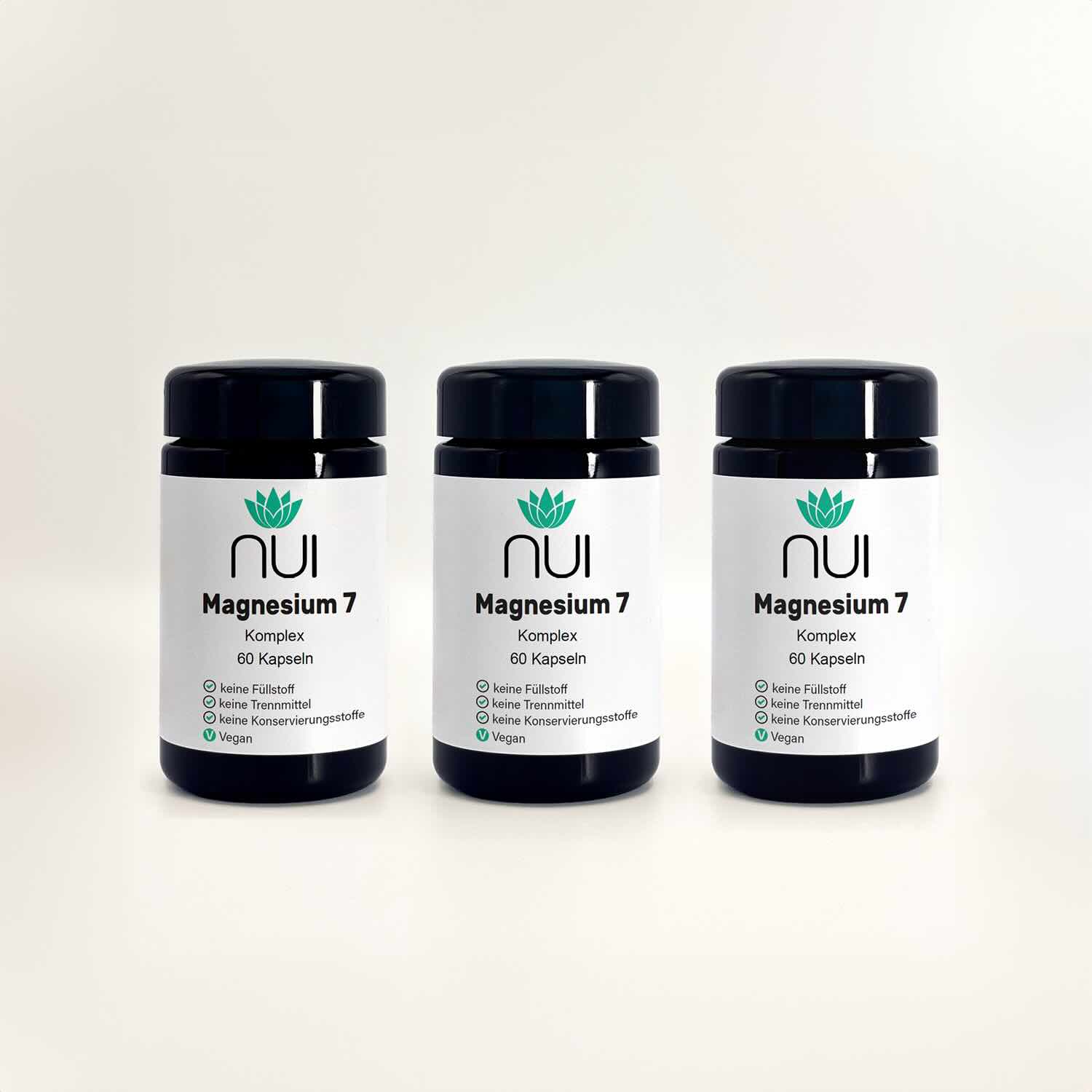 Magnesium 7: drei Kapselgläser nebeneinander vor hellem Hintergrund