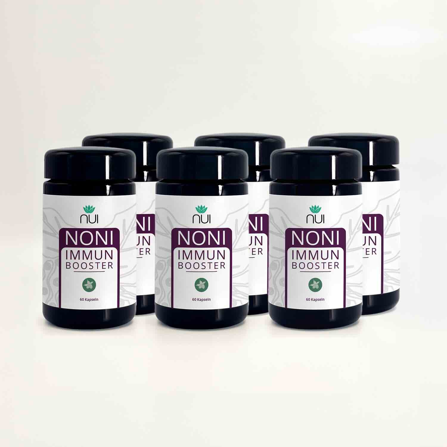 NUI NONI Immunbooster: sechs Kapselgläser in zwei Reihen vor hellem Hintergrund